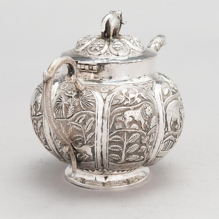 A 3-piece Asian silver tea set, presumably from the mid-20th century.