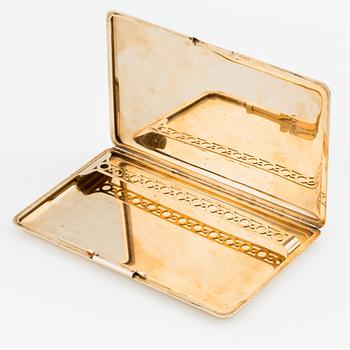 A Cartier cigarette case.