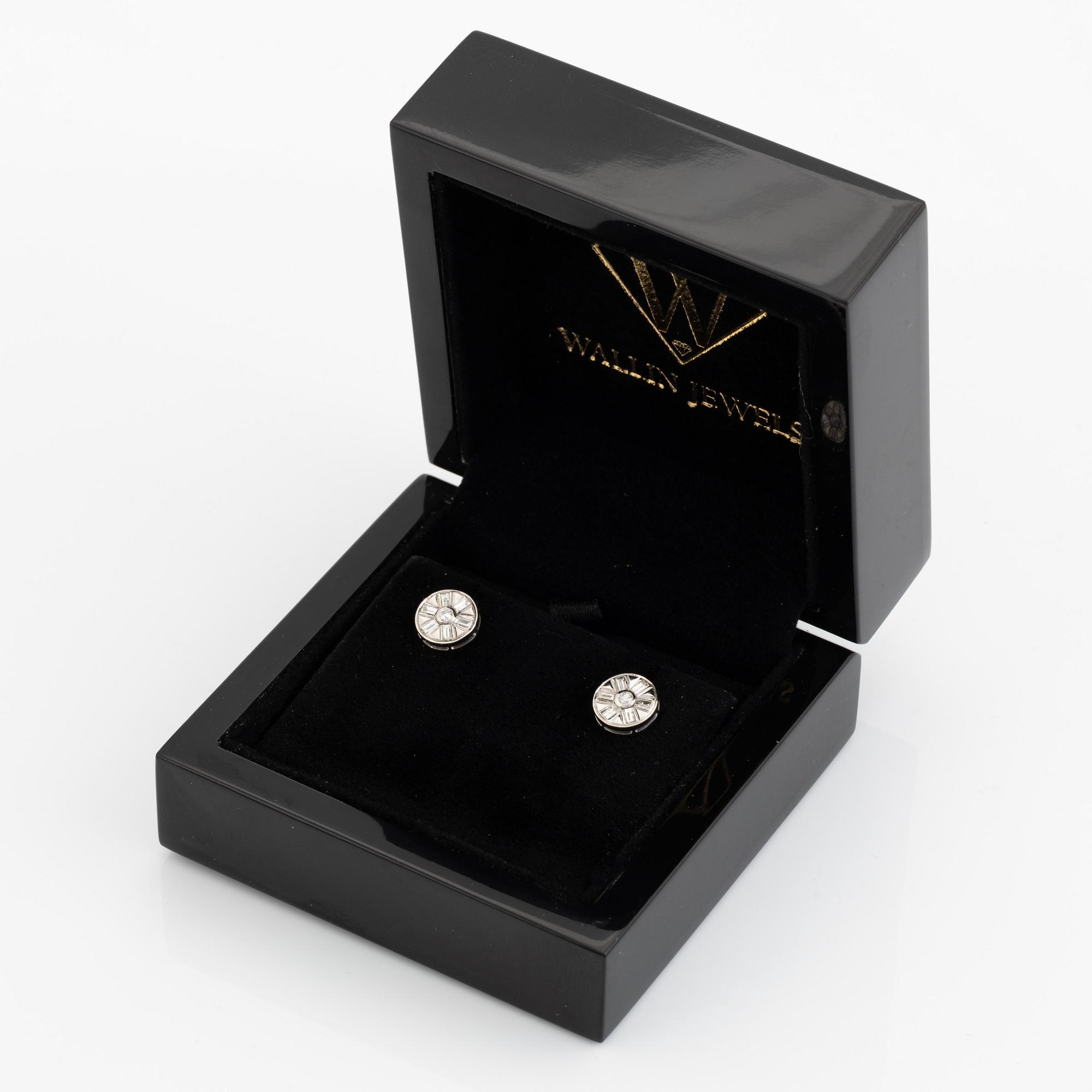 Brilliant and baguette cut diamond earrings.