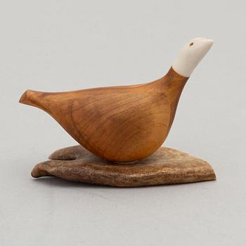 Lars Levi Sunna, a reindeer horn and birch figurine of a grouse, signed.