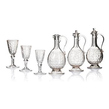 327. A cut and engraved glass service, 19th Century. (21 pieces).