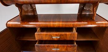 An Italian 1950s walnut sideboard.