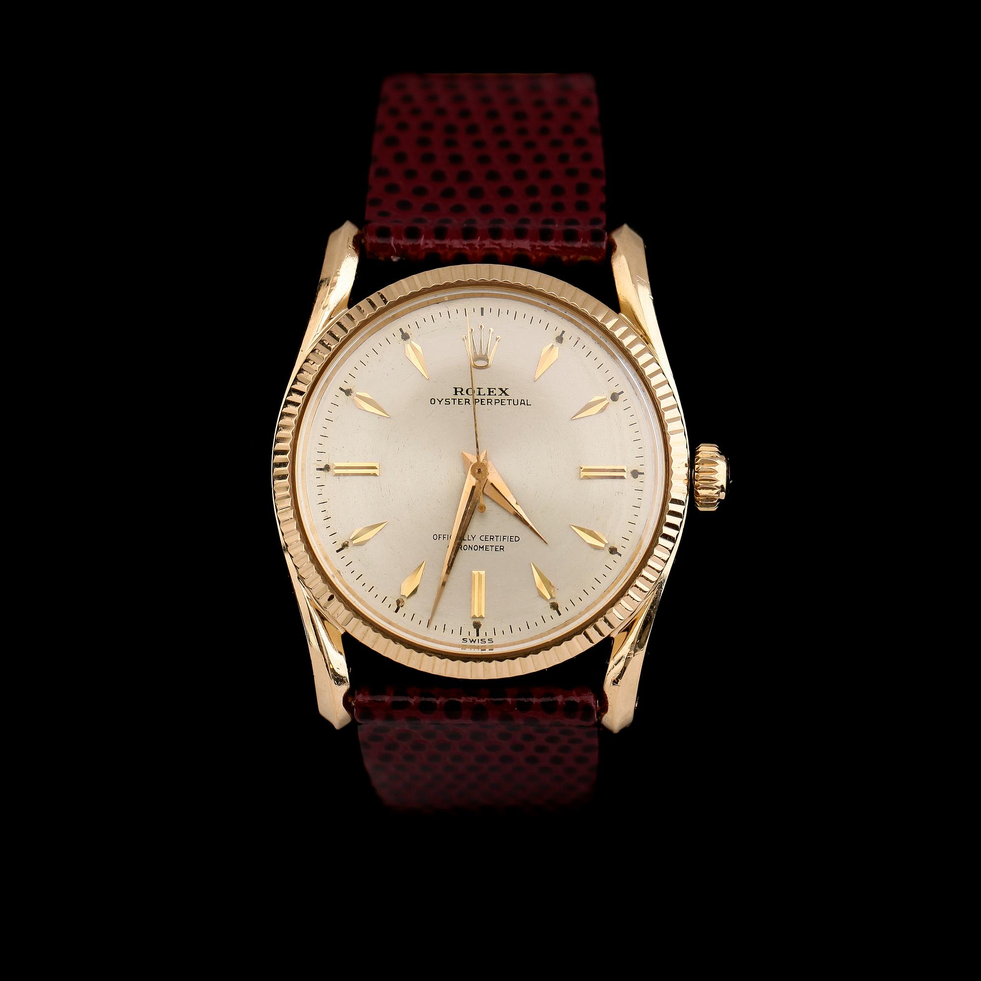 ARMBANDSUR, 18 k guld, Rolex Oyster Perpetual, Bombay 6590, 1900-talets mitt.
