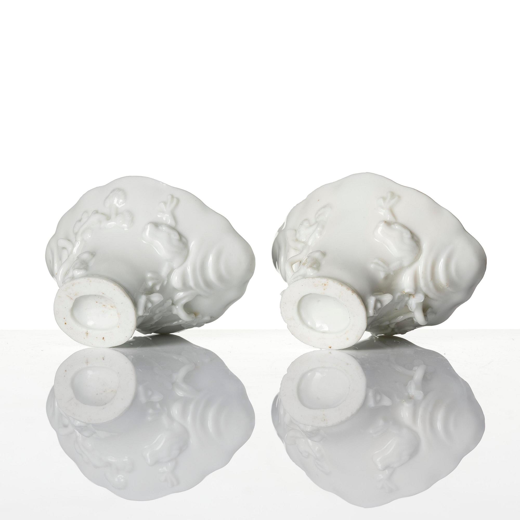 Two blanc de chine rhinoceros libation cups, Qing dynasty, Kangxi (1662-1722).