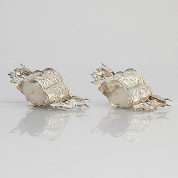 A pair of  Chinese silver cup holders/salts, 20th century.