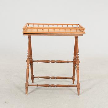 An oak tray table around 1900.
