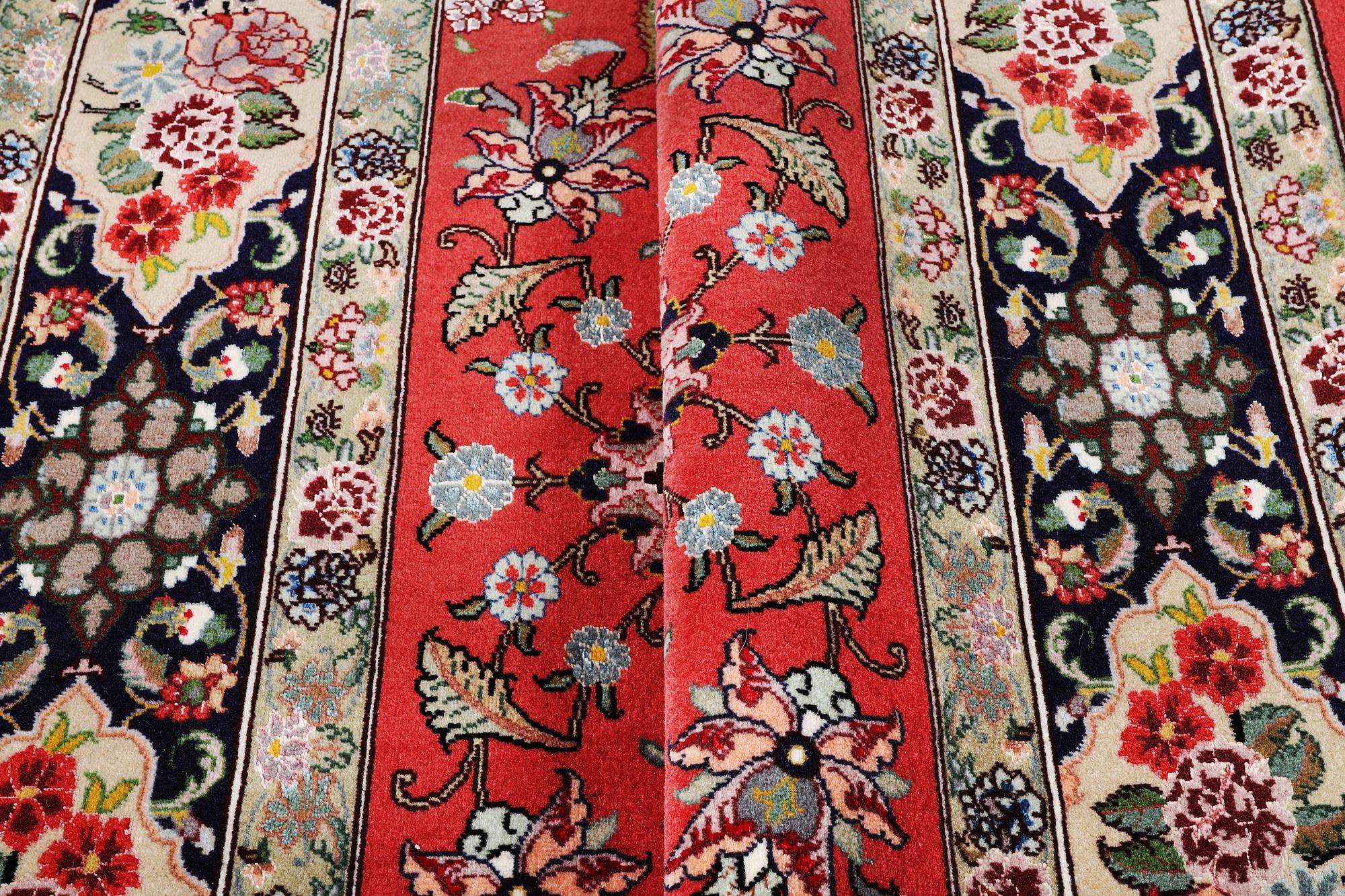 A carpet, Tabriz, part silk, c. 202 x 152 cm.