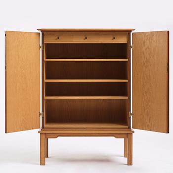 Oscar Nilsson, attributed to, a Swedish Modern oak cabinet, 1940s.