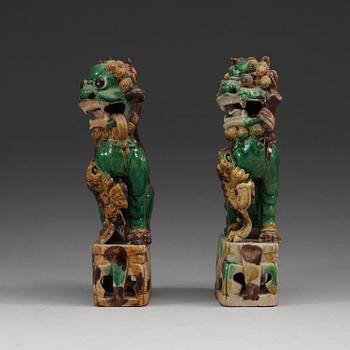 Two green, aubergine and yellow glazed bisquit joss stick holders, Qing dynasty, Kangxi (1662-1722).