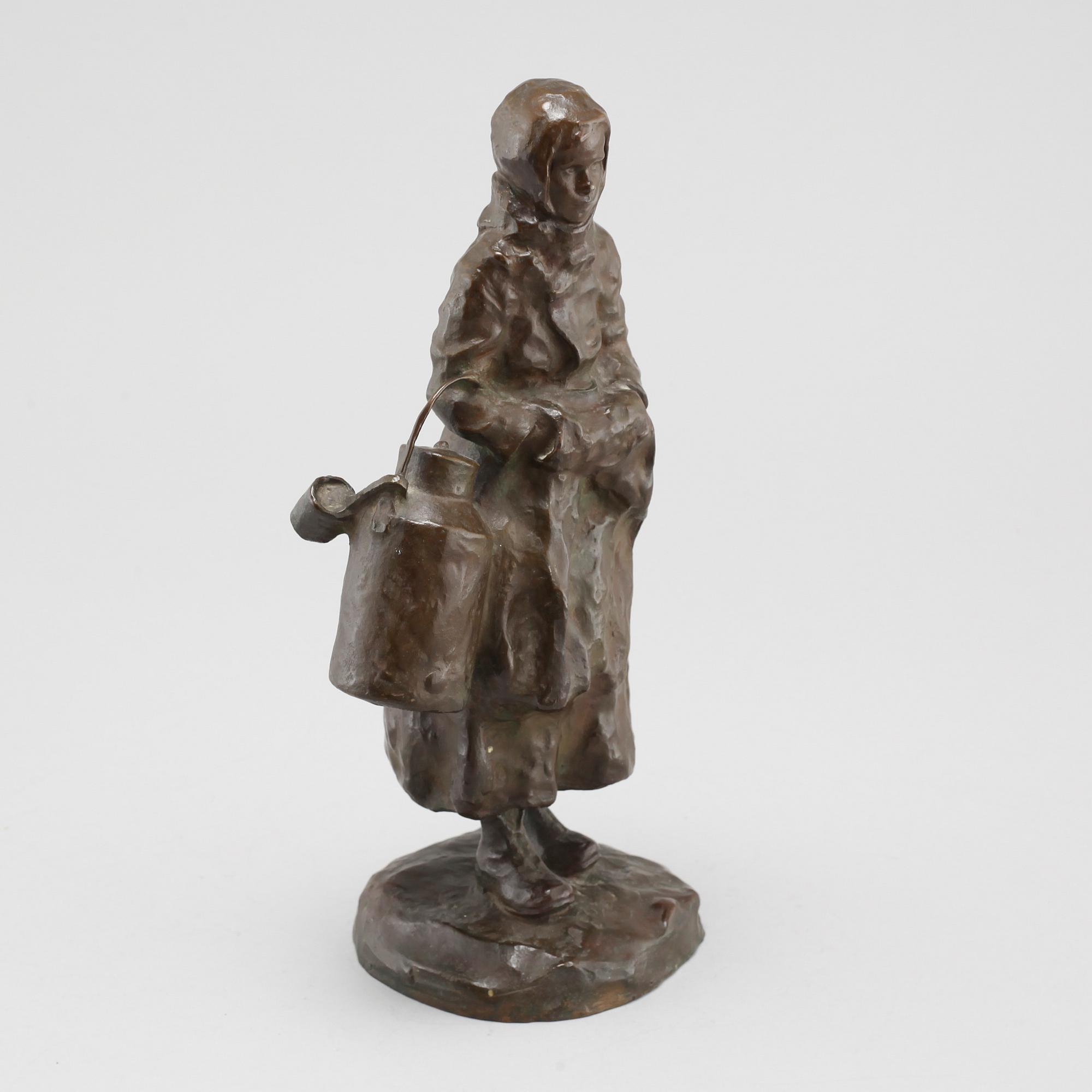 a bronze sculpture, signed and dated 1906.