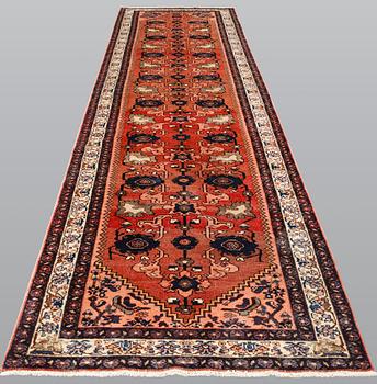 A semi-antique Malayer runner, c. 408 x 106 cm.