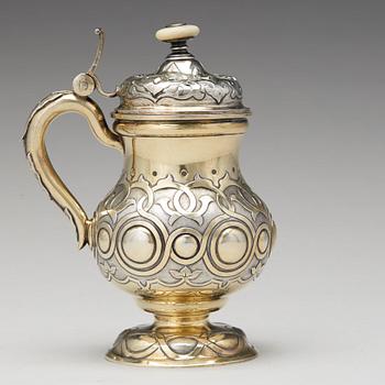 A Russian 19th century parcel-gilt silver tankard, unidentified makers mark, St. Petersburg 1864.