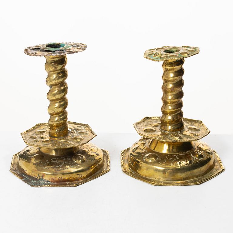 Two Baroque candle sticks, 18th Century.