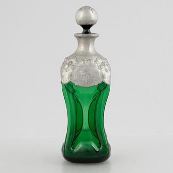 A green glass bottle with stopper, Sweden, early 20th century.