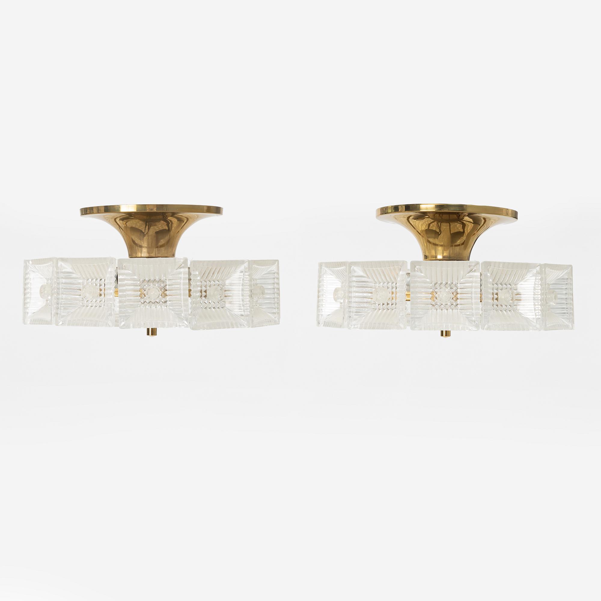 Carl Fagerlund, a pair of brass and glass ceiling lights, Orrefors.