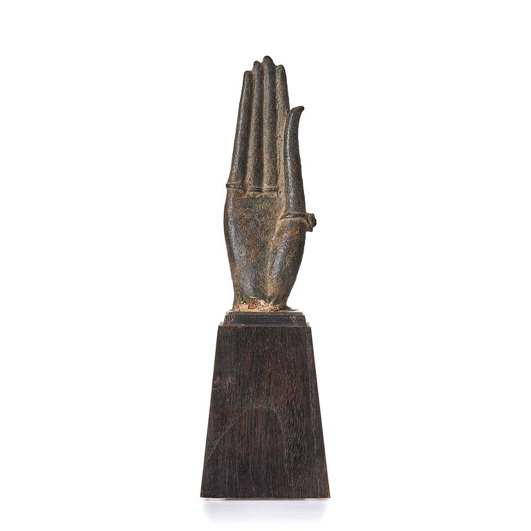 A bronze sculpture of buddhas hand, Thailand, 17th century.