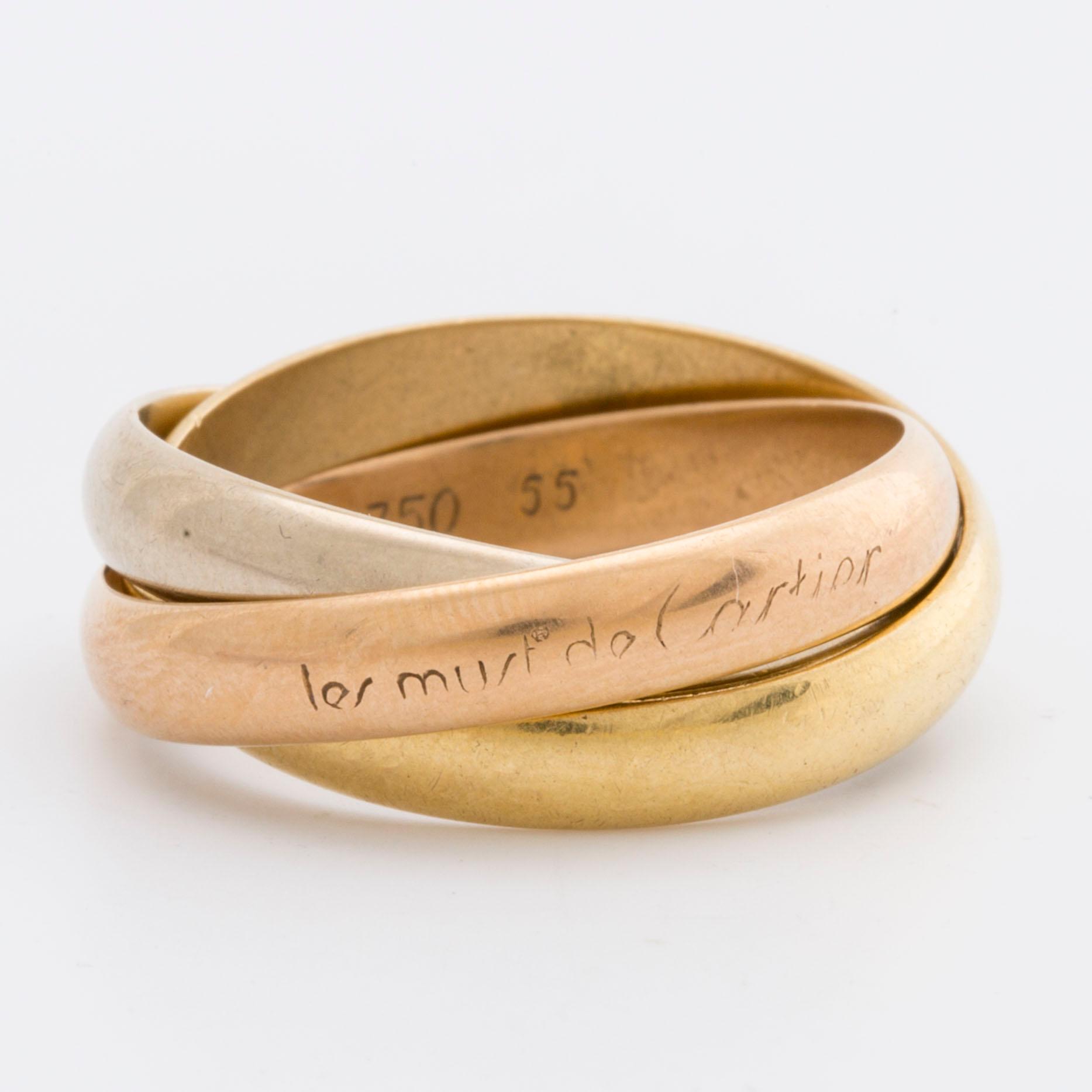 CARTIER RING Trinity le must de Cartier 18K tri coloured gold. Bukowskis