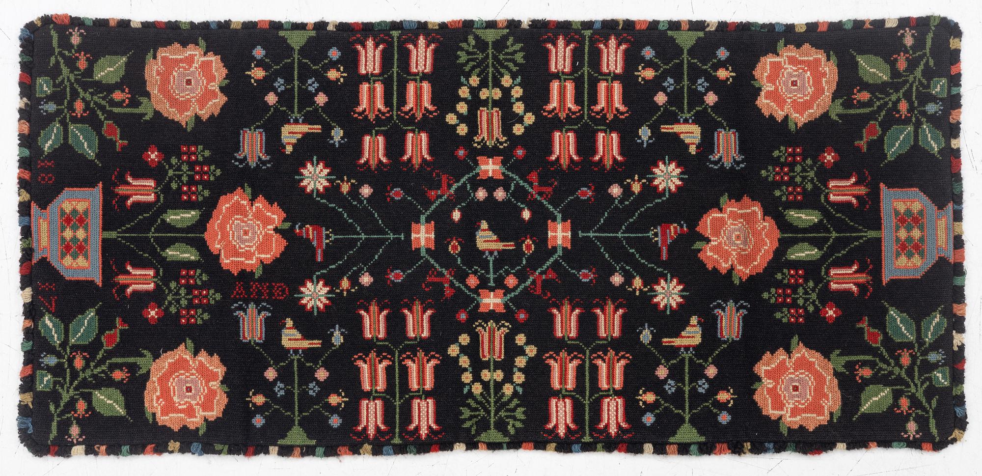 Åkdyna, korsstygnsbroderi, daterad 1817.