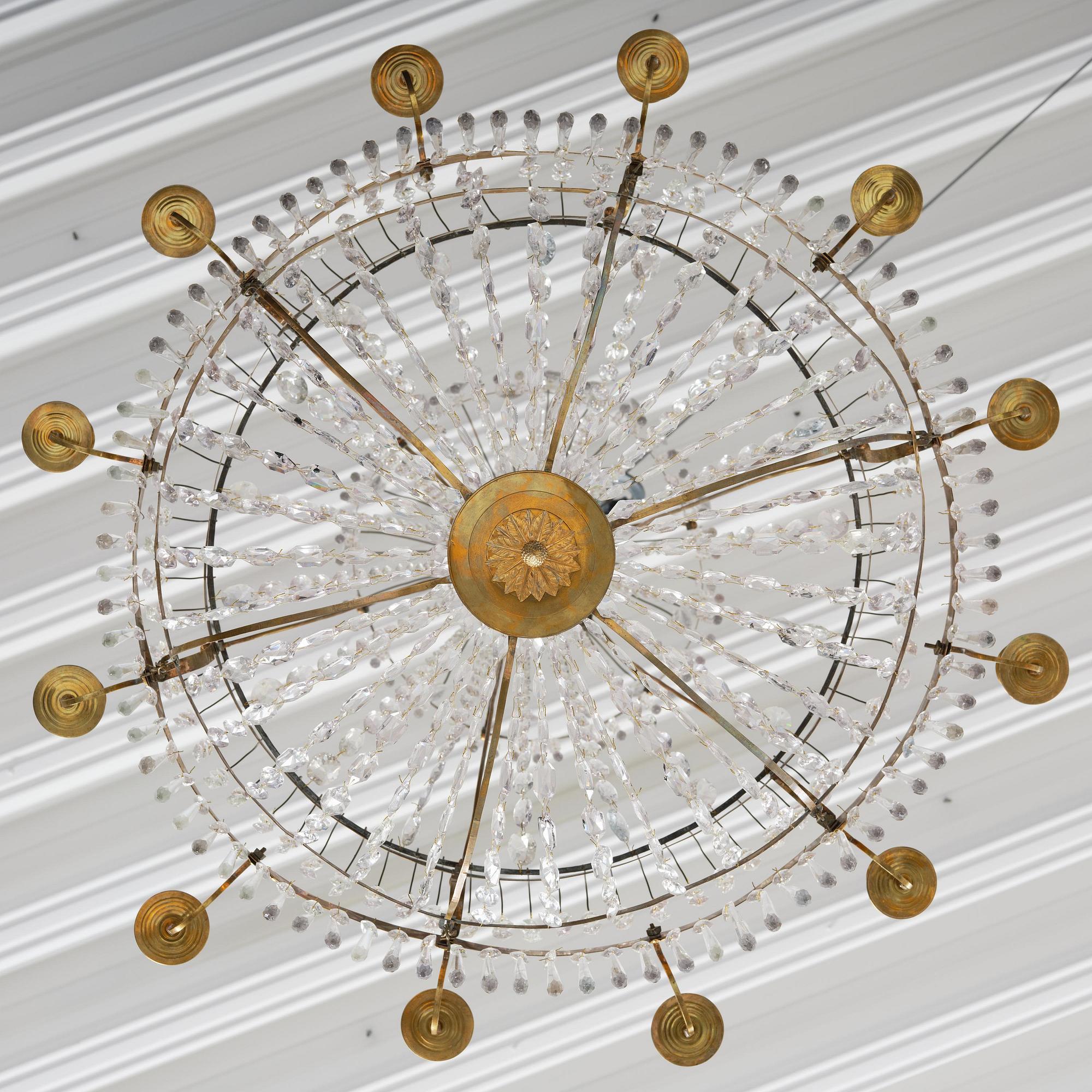 A late Gustavian thirteen-light gilt brass and cut glass chandelier, Stockholm, late 18th century.