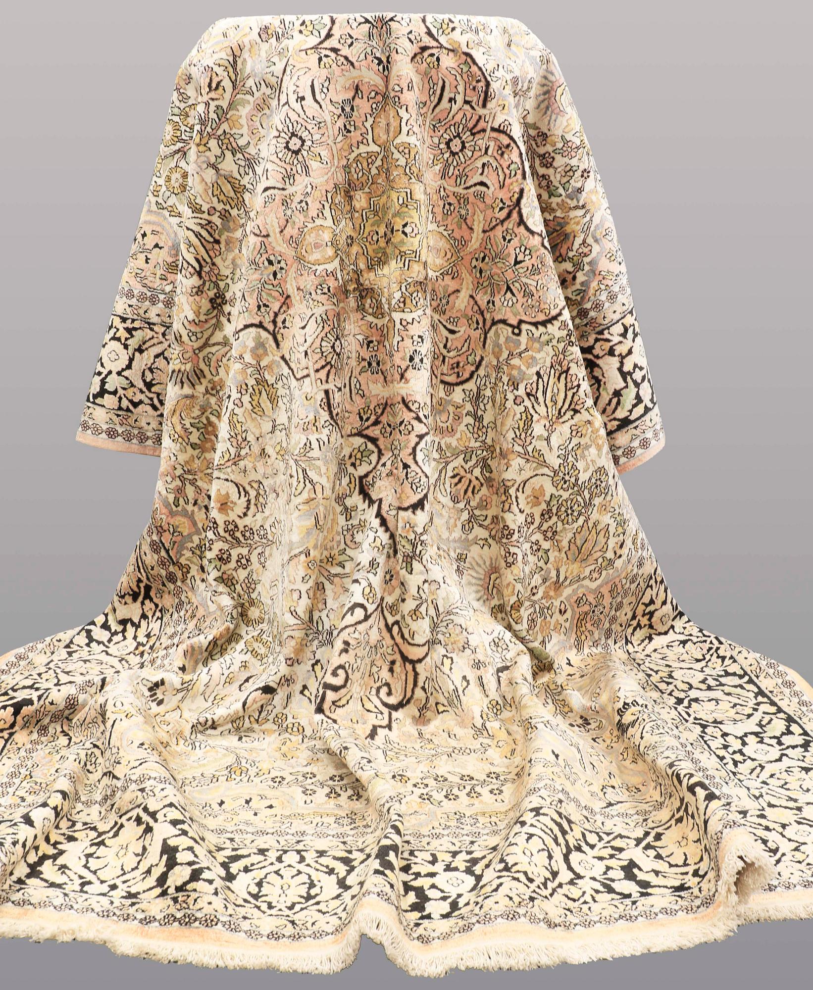 A CARPET, old silk Kashmir, ca 380 x 274 cm.