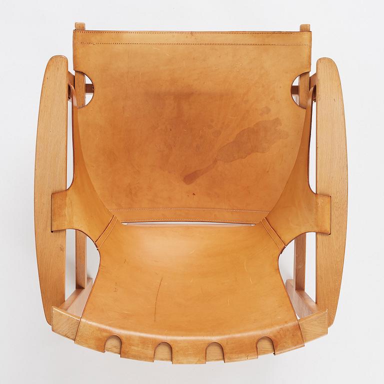 Carl-Axel Acking, a Swedish Modern oak and natural brown leather 'Trienna' chair, Nordiska Kompaniet.