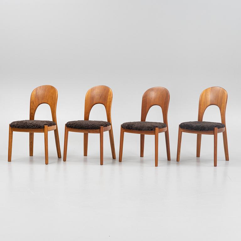 Niels Koefoed, eight teak dining chairs upholstered in new sheep skin, Denmark, 1960's.