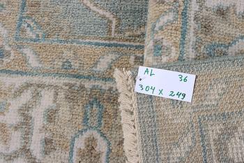 An oriental carpet with Mamluk design, c. 304 x 249 cm.