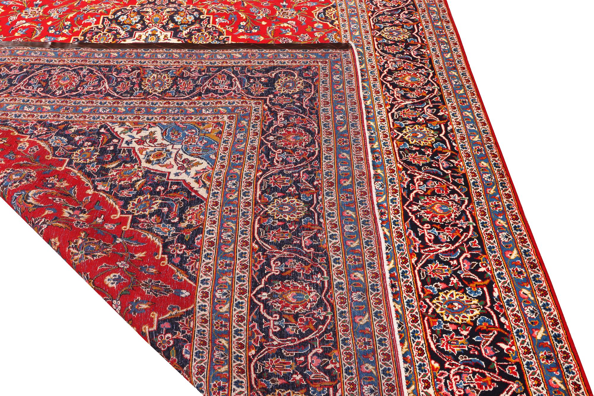 A Keshan carpet, c. 380 x 255 cm.