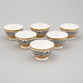 PIERO FORNASETTI, tallrikar, 4 st, samt skålar, 6 st, porslin, Milano, Italien.