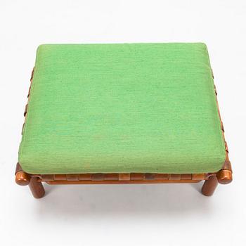 ILMARI TAPIOVAARA, a pair of mid-20th-Century armchairs and a stool for La Permanente Mobili Cantù, Italy.