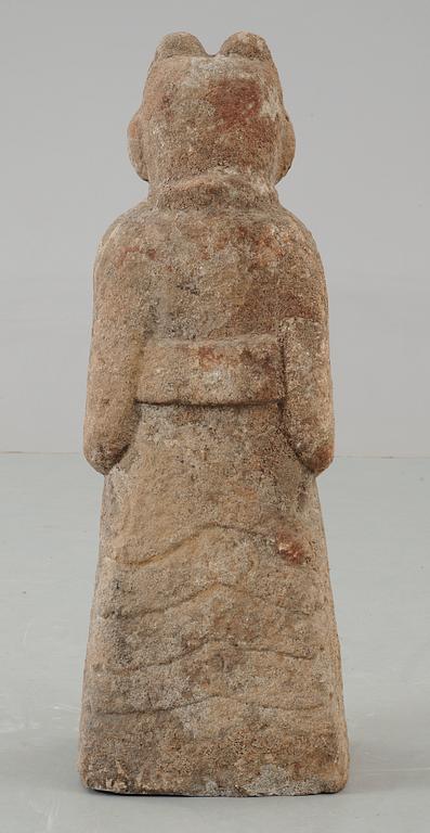 A stone sculpture of a guardian, presumably Han dynasty.