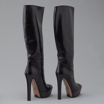 GUCCI, a pair of platform, high heel leather boots, size 37½.
