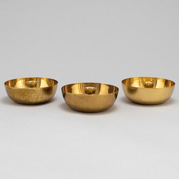 Three Vivianna Torun Bülow-Hübe brass candle golders, for Dansk International Design.