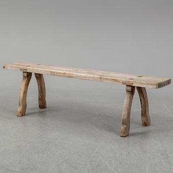 a 19th century pine bench.