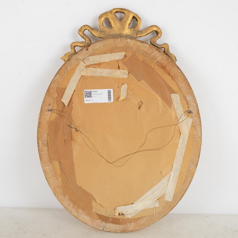 A Gustavian style mirror, first half of the 20th century.