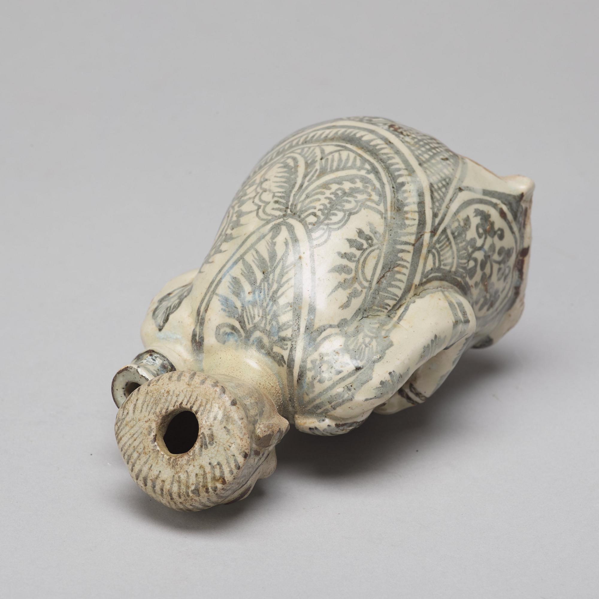 A Sawankhalok figurine/joss stick holder, 15th/16th Century.