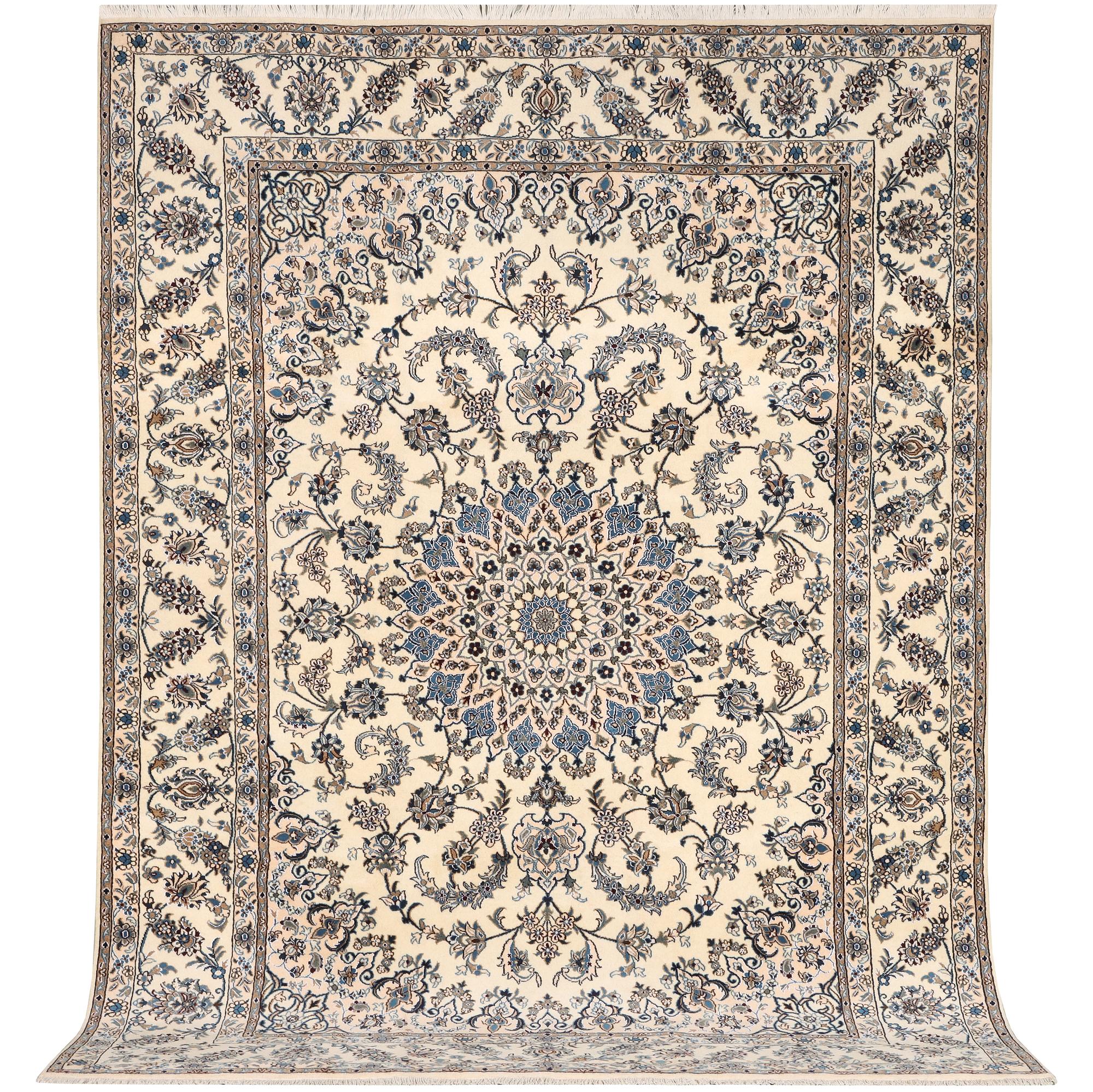 A Nain, part silk carpet, c. 337 x 244 cm.