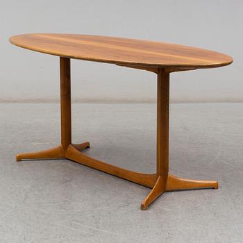 A 1959 'Plommonet' walnut coffee table by Kerstin Hörlin-Holmquist for Nordiska Kompaniet.