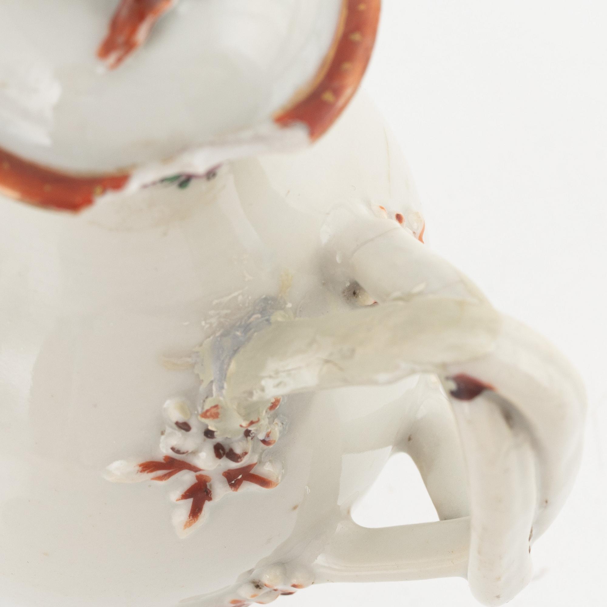 A blue and white moon flask and two creamers, porcelain, China, 18th-19th century.