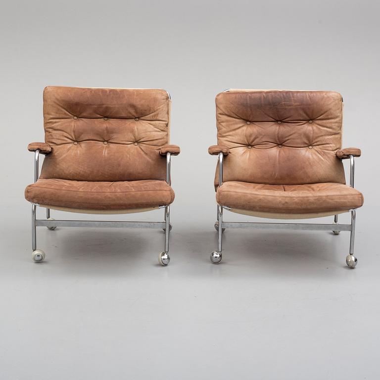 A PAIR OF BRUNO MATHSON ARMCHAIRS "KARIN" FOR DUX.