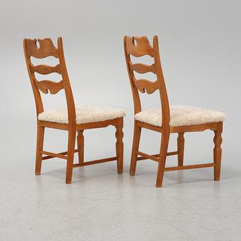 Henning Kjærnulf, a set of six oak 'Razorblade' chairs with new sheepskin upholstery, EGK, Denmark 1960s.