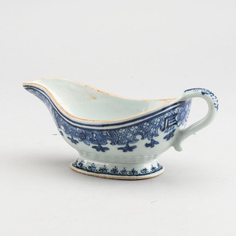 A Chinese porcelain Qianlong serving dish and saucer.