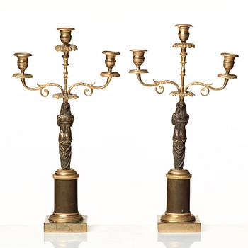 A pair of late Gustavian circa 1800 three-light candelabra.