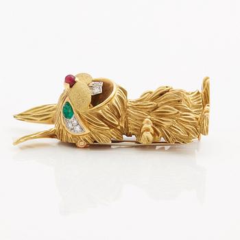 A ruby, cabochon cut emerald, brilliant- and single cut diamond 1950/60's brooch.