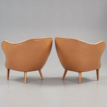 Arne Norell, A pair of Arne Norell 'Tummen/ The Thumb' easy chairs, Gösta Westerbergs Möbler, Stockholm 1950's.