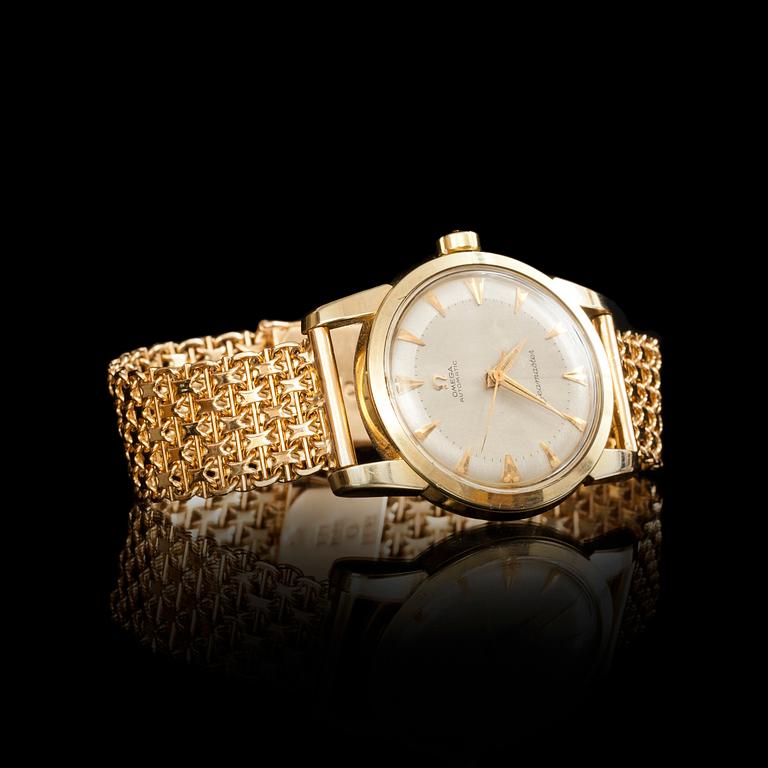 HERRARMBANDSUR, Omega Seamaster, armlänk i 18k guld. Vikt tot ca 40 g.