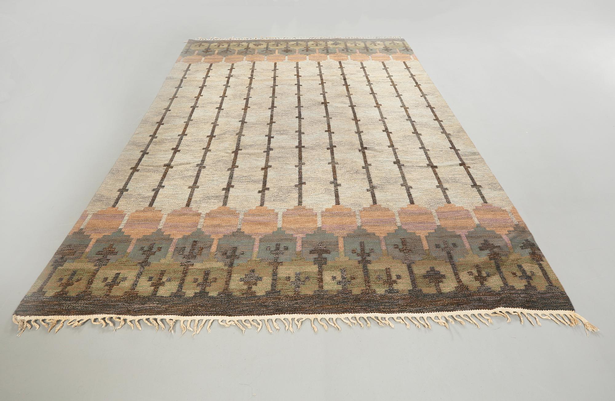 A flat weave by Judith Johansson, signed JJ, second half of the 20th century, 326 x 248 cm.