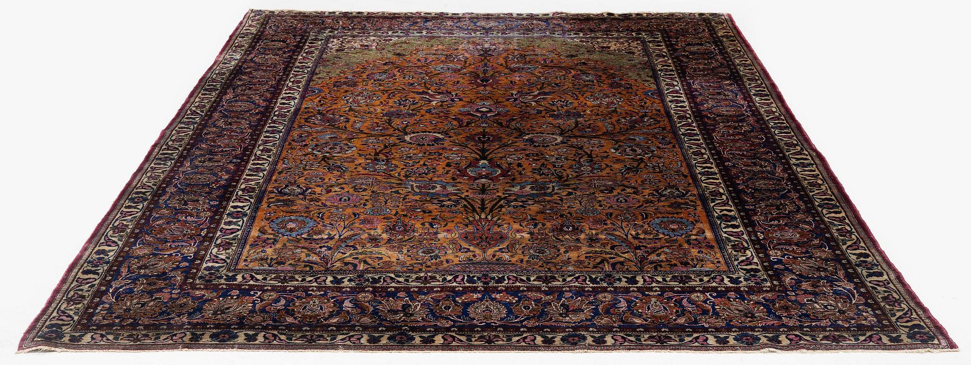 An antique silk Kashan carpet, central Persia (Iran), c. 314 x 210 cm.