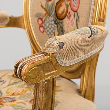 A Gustavian style arm chair, first half ot the 20th Century.