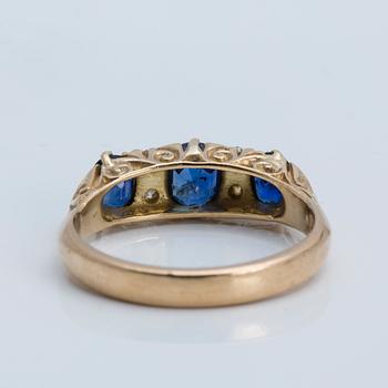 A sapphire and old-cut diamond ring, 1908.